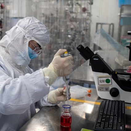 An engineer works on an experimental coronavirus vaccine at a laboratory in Beijing. Photo: AFP