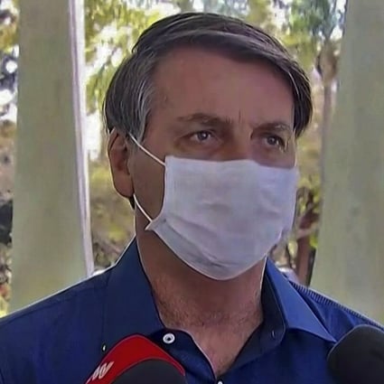 Brazil President Jair Bolsonaro announces he tested positive for the coronavirus but said he was feeling ‘perfectly well’ and had only mild symptoms. Photo: AFP