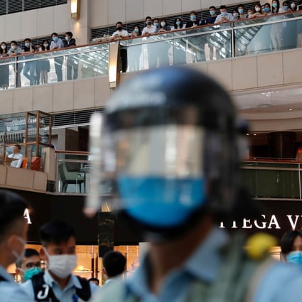 Riot police patrol a shopping mall during a protest in Hong Kong after the National People’s Congress passed a national security law for the city on June 30. Photo: Reuters