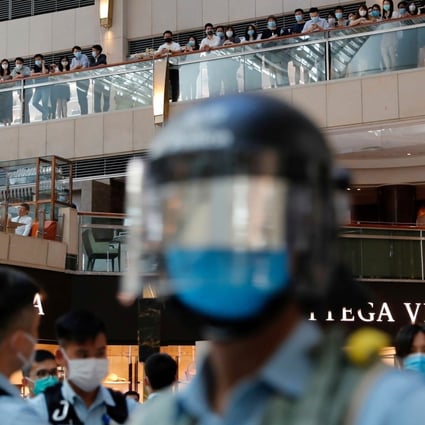 Riot police patrol a shopping mall during a protest in Hong Kong after the National People’s Congress passed a national security law for the city on June 30. Photo: Reuters