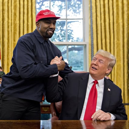 Rapper Kanye West (left) shakes hands with US President Donald Trump during a meeting in the Oval Office of the White House in Washington on October 11, 2018. Photo: Bloomberg