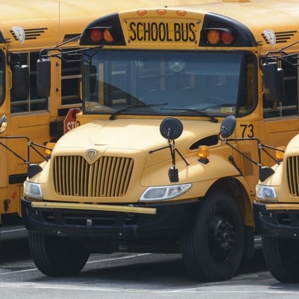 School buses are seen parked behind an elementary school in Pottsville, Pennsylvania, in June. Photo: AP