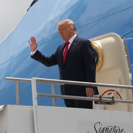 Donald Trump arrives at Miami International Airport on Friday. Photo: Miami Herald via AP