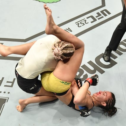 Amanda Ribas secures an armbar submission against Paige VanZant in their flyweight fight during UFC 251. Photo: Jeff Bottari/Zuffa LLC via USA TODAY Sports