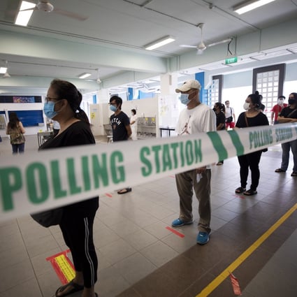 Voters queue to cast their ballots at a polling station in Singapore’s general election where Prime Minister Lee Hsien Loong said the result was “not as strong an endorsement as hoped”. Photo: EPA-EFE