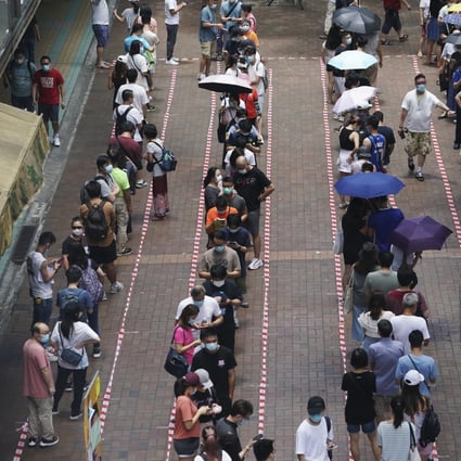 Long queues at a polling station in Tai Po on July 12, the second and final day of the pan-democrat Legco primary. Over 600,000 Hongkongers voted to help select opposition candidates for the Legco election in September. Photo: Felix Wong