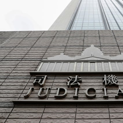 The logo of Judiciary of Hong Kong is seen outside West Kowloon Magistrates' Courts. Photo: Reuters