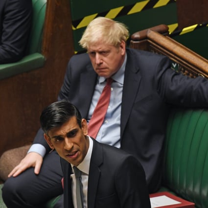 Britain's Prime Minister Boris Johnson listens to Britain's Chancellor of the Exchequer Rishi Sunak deliver his mini-budget in the House of Commons, London, 8 July 2020. China has warned Johnson will face ‘consequences’ if the UK treats it as a ‘hostile partner.’ Photo: EPA-EFE