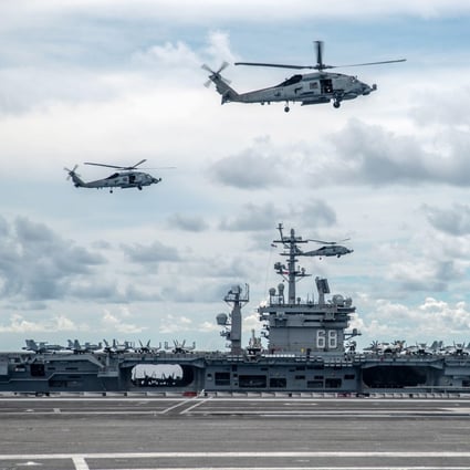 Two MH-60R Sea Hawks at a drill in the South China Sea on July 6, 2020. Photo: EPA-EFE/Handout