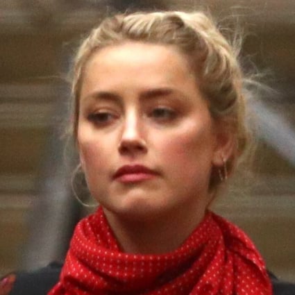 Actor Amber Heard leaves the High Court in London on Wednesday. Photo: Reuters