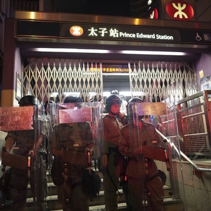 Police outside Prince Edward MTR station in Hong Kong on August 31 last year. Photo: AP