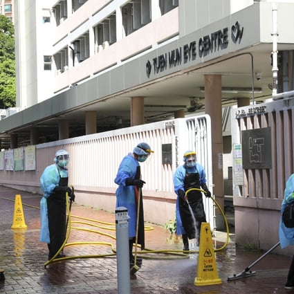 Disinfection works at Tuen Mun Eye Centre, where three members of administration staff were confirmed as infected with the coronavirus on Saturday. Photo: Dickson Lee