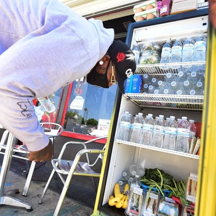 Restaurants, supermarkets, NGOs and neighbours chip in to keep the fridges filled. Photo: AFP