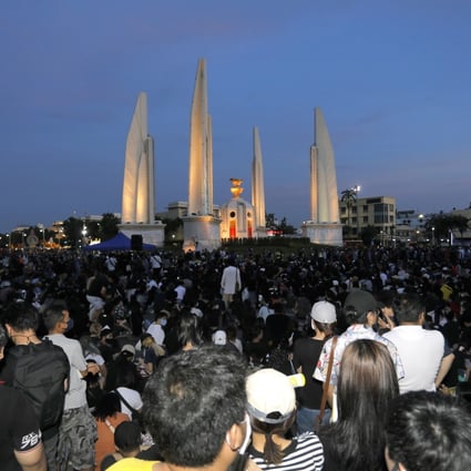 Thai anti-government protesters gather front of the Democracy Monument in Bangkok, calling for a new constitution, new elections and an end to repressive laws. Photo: AP
