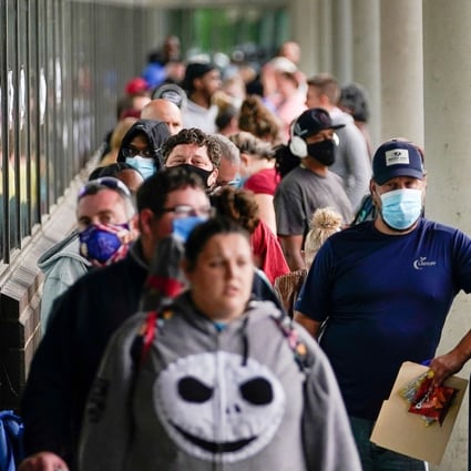 Hundreds of people line up outside a Kentucky career centre hoping to find help with their unemployment claim in Frankfort, Kentucky, on June 18. Worst-case scenario projections suggest unemployment could reach a peak of 12.5 per cent across the world’s most developed economies this year. Photo: Reuters