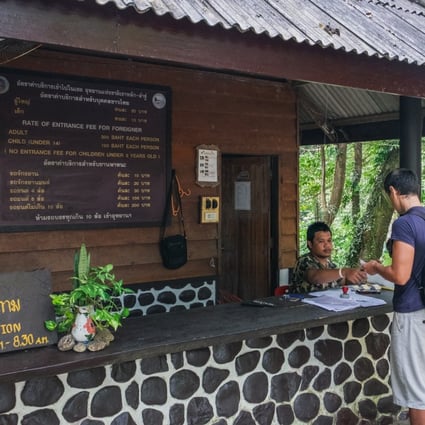 The bilingual ticket signage at the Khao Lak-Lam Ru National Park, in Phang Nga province, Thailand. Photo: Shutterstock