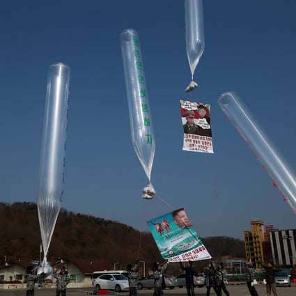 South Korea’s Ministry of Unification last week revoked the licences of two defector-led organisations involved in flying propaganda leaflets across the border. Photo: EPA