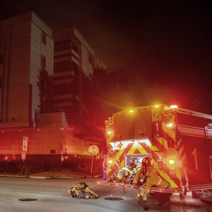 Firefighters respond to reports of a fire inside the Chinese consulate in Houston on July 21. Houston police and fire officials responded to reports that documents were being burned in the courtyard of the consulate, according to the Houston Police Department. Photo: AP