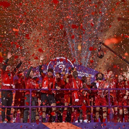 Liverpool Players Receive Long Awaited Premier League Trophy On Kop South China Morning Post Liverpool Players Receive Long Awaited Premier League Trophy On Kop South China Morning Post