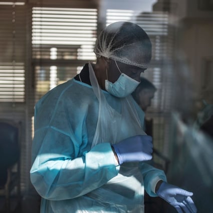 A nurse wearing personal protective equipment (PPE) is seen at Casa Serena, an aged care home in Johannesburg, on July 22, 2020. South Africa has been the worst hit by coronavirus but the World Health Organisation says other nations in Africa may follow with a surge in cases. Photo: AFP