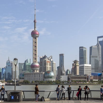 Shanghai should accelerate its development as a global financial centre, a report says. Photo: Xinhua