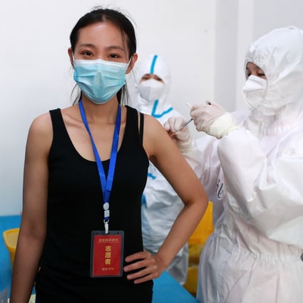 A woman takes part in a Covid-19 vaccine trial in the central China city of Wuhan in April. Photo: dpa
