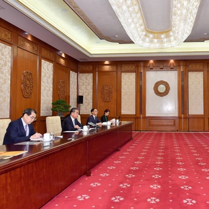 Chinese Foreign Minister Wang Yi attends a video meeting with his Indonesian counterpart Retno Marsudi on Thursday. Photo: Xinhua