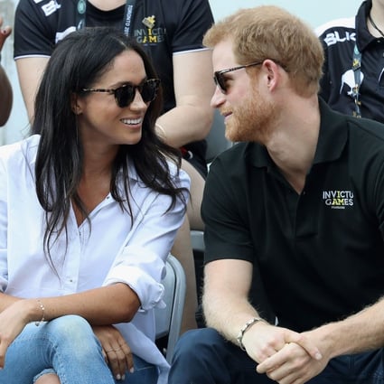 Meghan Markle and Prince Harry pictured during the Invictus Games 2017 in Toronto, Canada. Markle wore a simple white shirt and jeans – and it’s a look she still wears today. Photo: AFP