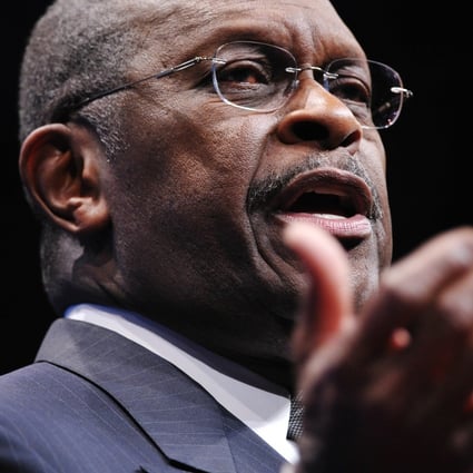 Former Republican presidential candidate Herman Cain speaks during an event at a hotel in Washington in February 2012. Photo: AFP