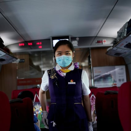 A crew member at work a high-speed train at Wuhan Railway Station in May 17. Photo: Reuters