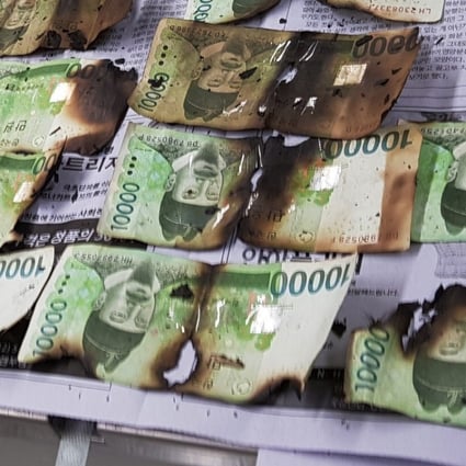 South Korean banknotes damaged after being heated up in a microwave. Photo: Bank of Korea via AP