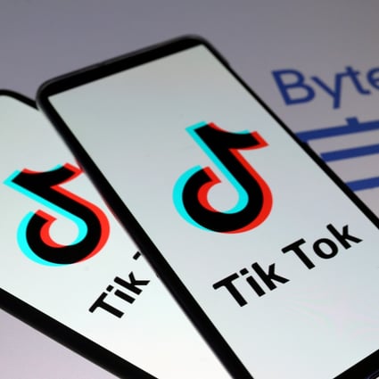 TikTok logos are seen on smartphones in front of a displayed ByteDance logo in this illustration taken November 27, 2019. Photo: Reuters