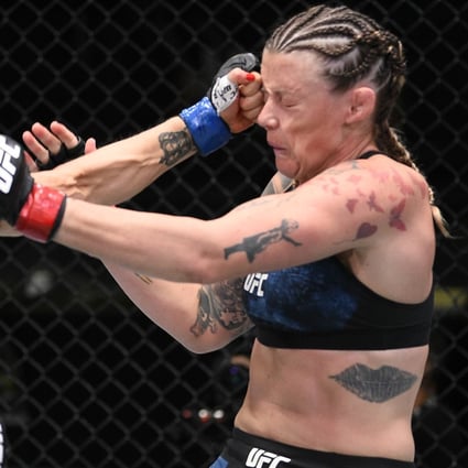 Jennifer Maia punches Joanne Calderwood in their flyweight fight during UFC Fight Night in Las Vegas. Photos: Chris Unger/Zuffa LLC via Getty Images