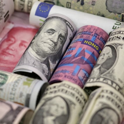 US dollars accounted for 58 per cent of China’s foreign exchange reserves at the end of 2015. Photo: Reuters