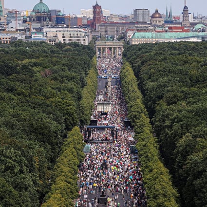 Thousands take part in a protest near Berlin’s Brandenburg Gate against the government's Covid-19 restrictions. Photo: Reuters
