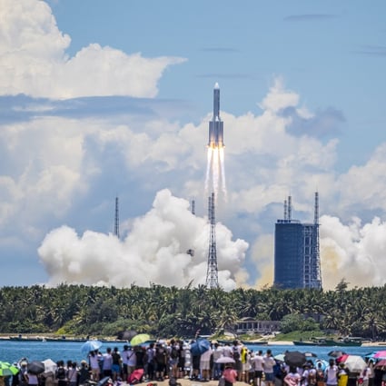 The rocket carrying China's Tianwen-1 Mars rover lifts off in Wenchang, Hainan province, on July 23. While the narrative of a “space race” between China and the United States is emerging, the gap between the two remains too large to generate significant competition. Photo: EPA
