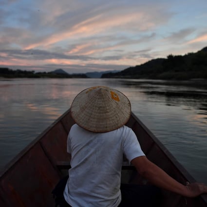 A fishing boat travels along the Mekong River in the northeastern Thai province of Nong Khai. Photo: AFP