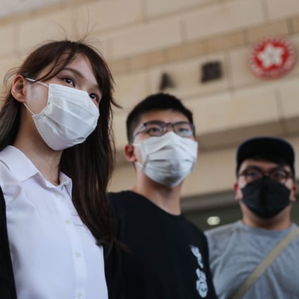 Agnes Chow, Joshua Wong and Ivan Lam arrive at West Kowloon Court on Wednesday. Photo: Sam Tsang