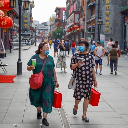 Shoppers in Beijing on July 30. China’s massive domestic consumption is the most important driver in its new policy, which means ensuring that the job market is in good health. Photo: Reuters