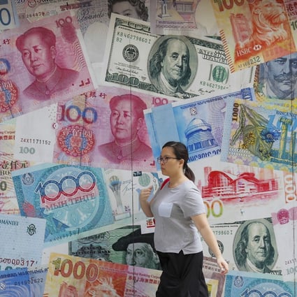 China’s State Administration of Foreign Exchange has waived interbank transaction fees for a basket of 12 currencies, not including those of countries with whom China has tenuous relations. Photo: AP