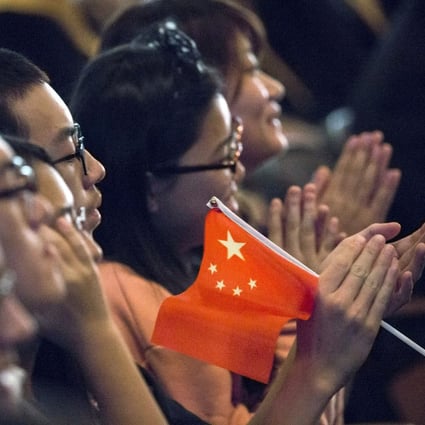 Students clap as Chinese President Xi Jinping delivers a speech during a visit to Lincoln High School in Tacoma, Washington, in September 2015. Photo: Reuters