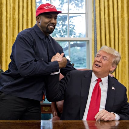 Rapper Kanye West (left) shakes hands with US President Donald Trump during a meeting in the Oval Office of the White House in 2018. Trump says he is not involved in Republican efforts to help get the rapper’s name on the presidential ballot in crucial swing states in November’s election. Photo: Bloomberg