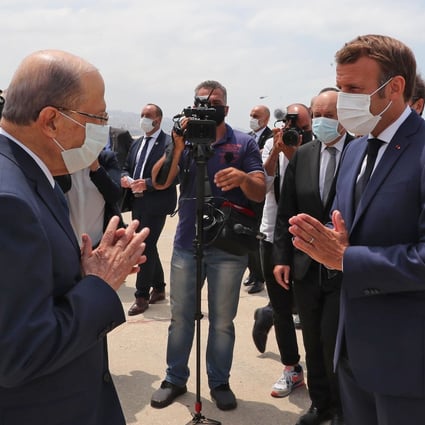Lebanon’s President Michel Aoun (left) receiving his French counterpart Emmmanuel Macron at the airport in Beirut. Photo: AFP