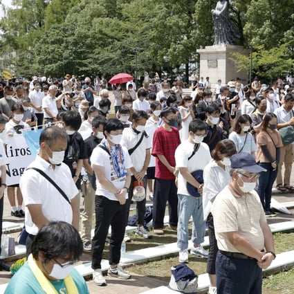 People offer silent prayers for the victims of the 1945 atomic bombing on Nagasaki. Photo: Kyodo