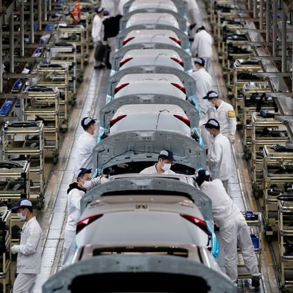Employees work on a production line inside a Dongfeng Honda factory in Wuhan, Hubei province, on April 8. China’s swift return to positive economic growth is a rare bright spot amid a landscape of doom and gloom as the pandemic continues. Photo: Reuters