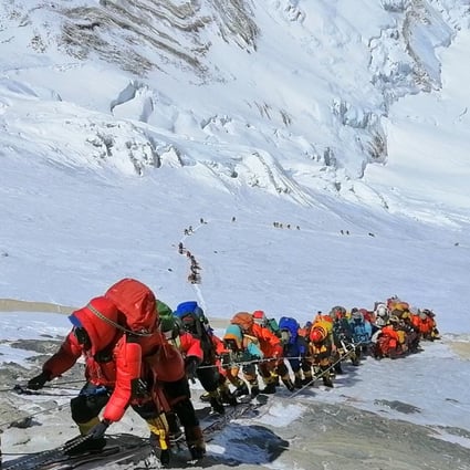 Climbers queued on Mount Everest on May 22 last year. Eleven climbers perished during the 2019 spring climbing season. Photo: AP
