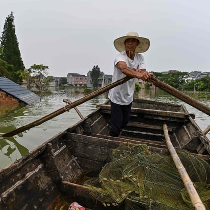 Floods have devastated large parts of the country this year. Photo: AFP