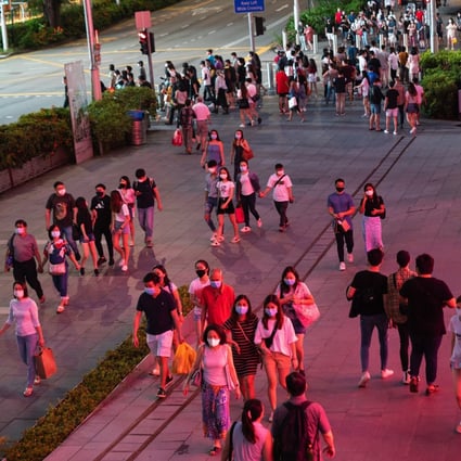 Pedestrians on Orchard Road, Singapore. Photo: Bloomberg