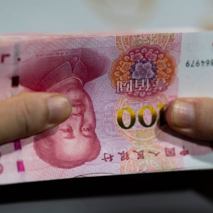 Chinese banks extended 992.7 billion yuan (US$142 billion) in new yuan loans in July, down from 1.81 trillion yuan in June. Photo: AFP
