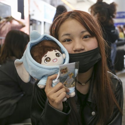 Some K-pop fan-girls fear ridicule from friends and family for having ‘lowbrow tastes’. This 14-year-old fan spent the night at Hong Kong International Airport to catch a glimpse of BTS. Photo: Rachel Cheung
